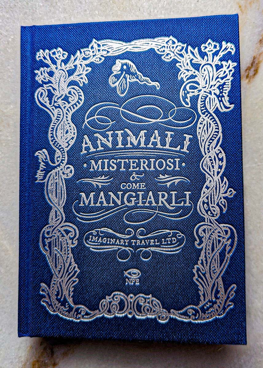 Copertina del libro di ricette 'Animali misteriosi e come mangiarli' per le idee shopping di Nerd in Spalla: viaggiatori poco seri